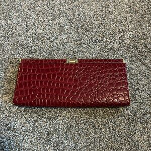 Joan Rivers, Red Faux Alligator skin clutch bag